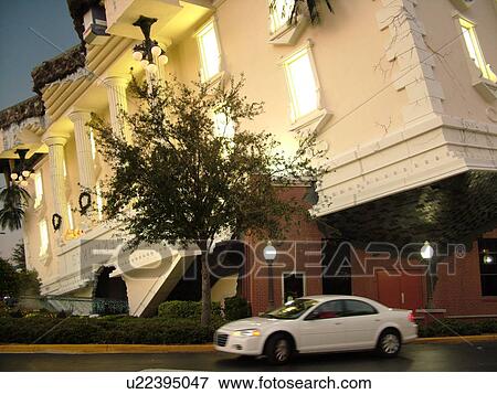 Orlando, FL, Florida, Wonder Works, upside-down buildings, evening View Large Photo Image Stock Photo - Orlando, FL, Florida, Wonder Works, upside-down buildings, evening. Fotosearch