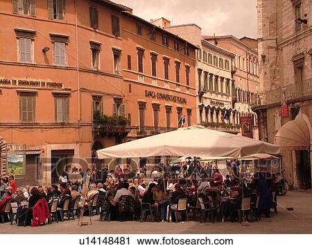 Stock Image -  outdoor cafT, Perugia, Umbria, Italy, Europe, Outdoor cafTs along Corso Vannucci Street in the medieval town of Perugia.. Fotosearch