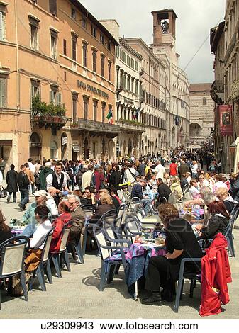 Stock Image -  outdoor cafT, Perugia, Umbria, Italy, Europe, Outdoor cafTs along Corso Vannucci Street in the medieval town of Perugia.. Fotosearch