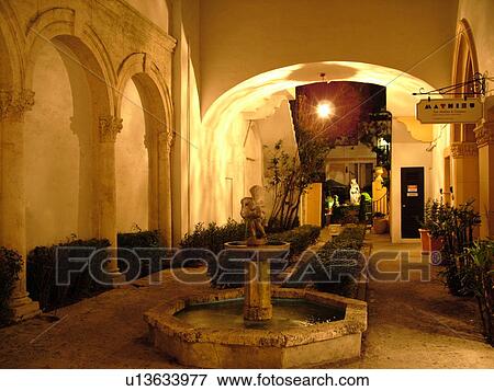 Palm Beach, FL, Florida, downtown, Worth Avenue, shopping district, exclusive shops, arcade, evening View Large Photo Image Stock Photo - Palm Beach, FL, Florida, downtown, Worth Avenue, shopping district, exclusive shops, arcade, evening. Fotosearch