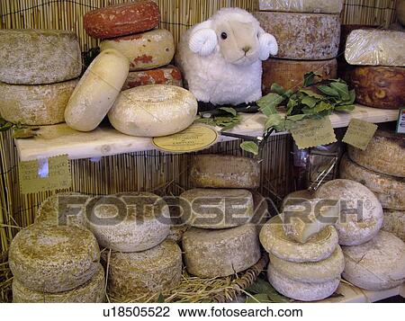 Stock Image -  pecorino cheese, Tuscany, Italy, Arezzo, Toscana, Europe, Local Pecorino cheeses for sale in the local store in the town of Arezzo.. Fotosearch