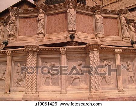 Stock Photograph -  Perugia, Umbria, Italy, Europe, Relief sculpture on the Fontana Maggiore in the medieval town of Perugia.. Fotosearch