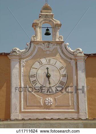 Picture -  Pisa, Italy, Tuscany, Toscana, Europe, Clock and bell on the Arcivescovado in the Piazza Arcivescovado in the city of Pisa.. Fotosearch