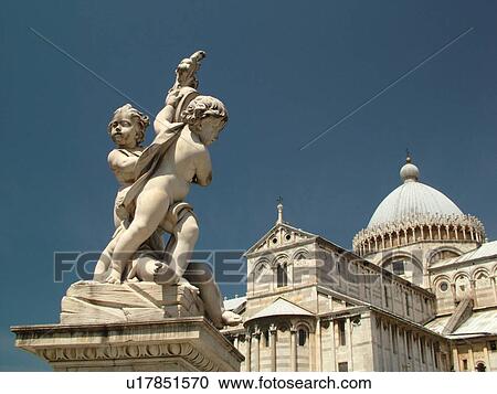Pisa, Tuscany, Italy, Toscana, Europe, Cupid statue outside the Cathedral in Campo dei Miracoli (Field of Miracles) in the city of Pisa. View Large Photo Image Stock Image - Pisa, Tuscany, Italy, Toscana, Europe, Cupid statue outside the Cathedral in Campo dei Miracoli (Field of Miracles) in the city of Pisa.. Fotosearch