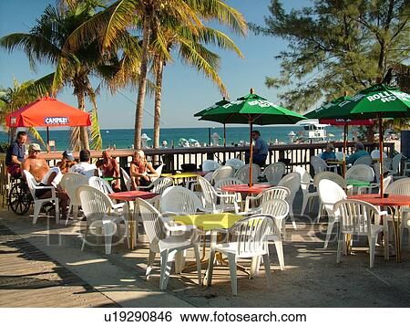 Stock Photograph -  Pompano Beach, FL, Florida, ocean, outdoor cafT, terrace. Fotosearch