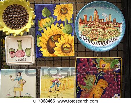 Stock Photograph -  pottery, Tuscany, Italy, San Gimignano, Toscana, Europe, Ceramic pottery displayed at a local store in the medieval town of San Gimignano.. Fotosearch