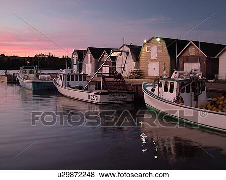 Prince Edward Island, Canada, North Rustico, Queens County, Gulf of Saint Lawrence, fishing village, marina, fishing boats, sunset View Large Photo Image Stock Photo - Prince Edward Island, Canada, North Rustico, Queens County, Gulf of Saint Lawrence, fishing village, marina, fishing boats, sunset. Fotosearch