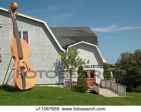 Prince Edward Island, Canada, Queens County, Cavendish, Giant fiddle displayed outside the Fiddlers & Followers Building at Rainbow Valley View Large Photo Image Stock Photo - Prince Edward Island, Canada, Queens County, Cavendish, Giant fiddle displayed outside the Fiddlers & Followers Building at Rainbow Valley. Fotosearch