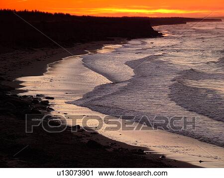 Stock Image -  Prince Edward Island, Cavendish Beach, Canada, Queens County, Gulf of Saint Lawrence, Prince Edward Island National Park, scenic coastline, sunset. Fotosearch