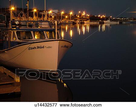 Stock Photo -  Prince Edward Island, North Rustico, Canada, Queens County, Gulf of Saint Lawrence, fishing village, harbor, fishing boats, marina, evening. Fotosearch