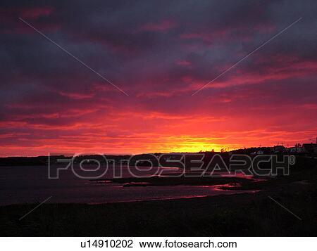 Stock Image -  Prince Edward Island, Queens County, Canada, Gulf of Saint Lawrence, North Rustico, sunset, fishing village, harbor . Fotosearch