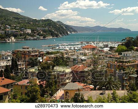 Rapallo, Liguria, Italy, Riviera di Levante, Ligurian Riviera, Europe, Scenic view of the resort town of Rapallo on the Gulf of Tigullio (Gulfo di Tigullio) along the Ligurian Sea on the Ligurian Riviera. View Large Photo Image Stock Image - Rapallo, Liguria, Italy, Riviera di Levante, Ligurian Riviera, Europe, Scenic view of the resort town of Rapallo on the Gulf of Tigullio (Gulfo di Tigullio) along the Ligurian Sea on the Ligurian Riviera.. Fotosearch