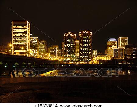 Richmond, VA, Virginia, James River, downtown skyline, high-rises, evening, high-rise buildings outlined with white lights View Large Photo Image Picture - Richmond, VA, Virginia, James River, downtown skyline, high-rises, evening, high-rise buildings outlined with white lights. Fotosearch