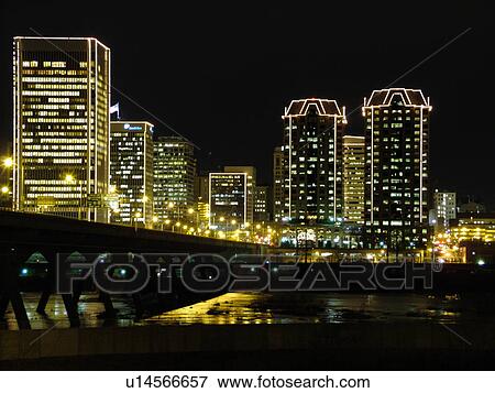 Richmond, VA, Virginia, James River, downtown skyline, high-rises, evening, high-rise buildings outlined with white lights View Large Photo Image Stock Photo - Richmond, VA, Virginia, James River, downtown skyline, high-rises, evening, high-rise buildings outlined with white lights. Fotosearch