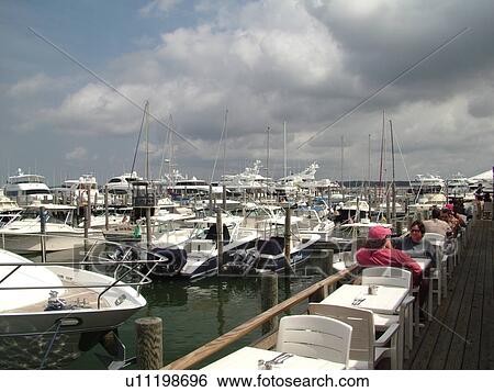 Stock Photograph -  Sag Harbor, NY, New York, Long Island, Atlantic Ocean, marina, wharf, pier, outdoor restaurant, cafT. Fotosearch