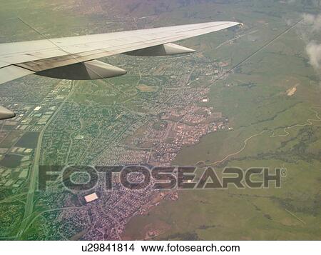 San Francisco Bay Area, CA, California, Aerial, wing, airplane flying over the town of Fremont. View Large Photo Image Picture - San Francisco Bay Area, CA, California, Aerial, wing, airplane flying over the town of Fremont.. Fotosearch