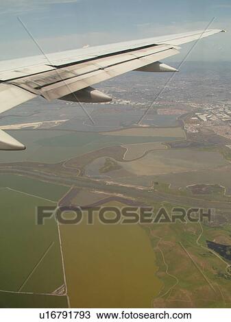 San Francisco Bay Area, CA, California, Aerial, wing, airplane flying over Don Edwards National Wildlife Refuge View Large Photo Image Stock Image - San Francisco Bay Area, CA, California, Aerial, wing, airplane flying over Don Edwards National Wildlife Refuge. Fotosearch