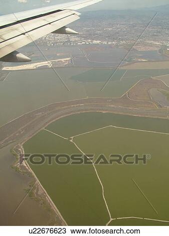 San Francisco Bay Area, CA, California, Aerial, wing, airplane flying over Don Edwards National Wildlife Refuge View Large Photo Image Stock Image - San Francisco Bay Area, CA, California, Aerial, wing, airplane flying over Don Edwards National Wildlife Refuge. Fotosearch