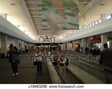 Stock Photograph -  San Francisco, CA, California, San Francisco International airport, hub, moving sidewalk, concourse, airport terminal . Fotosearch