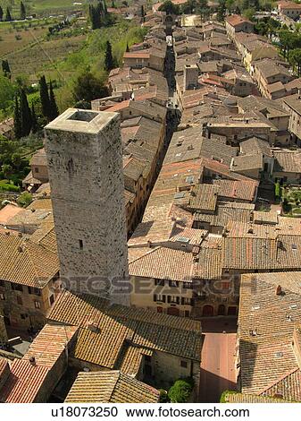 San Gimignano, Tuscany, Italy, Toscana, Europe, Aerial view of the rooftops and medieval town of San Gimignano from Torre Grossa. View Large Photo Image Stock Image - San Gimignano, Tuscany, Italy, Toscana, Europe, Aerial view of the rooftops and medieval town of San Gimignano from Torre Grossa.. Fotosearch