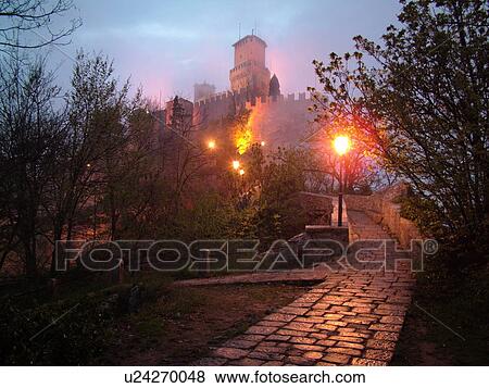 San Marino, Italy, Europe, Republic of San Marino, Guaita Rocca and Rock Tower on a foggy night in the hilly city-state of San Marino. View Large Photo Image Stock Photo - San Marino, Italy, Europe, Republic of San Marino, Guaita Rocca and Rock Tower on a foggy night in the hilly city-state of San Marino.. Fotosearch