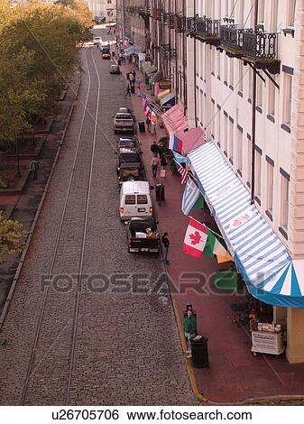 Stock Photograph -  Savannah, GA, Georgia, Historic Waterfront, River Street, downtown, cobblestone street. Fotosearch