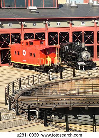 Stock Image -  Scranton, PA, Pennsylvania, Steamtown National Historic Site, railroad, turntable, roundhouse, caboose, steam locomotive. Fotosearch