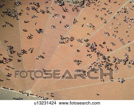 Siena, Italy, Tuscany, Toscana, Europe, Aerial view of people in the Piazza del Campo in the city of Siena from Torre del Mangia. View Large Photo Image Picture - Siena, Italy, Tuscany, Toscana, Europe, Aerial view of people in the Piazza del Campo in the city of Siena from Torre del Mangia.. Fotosearch