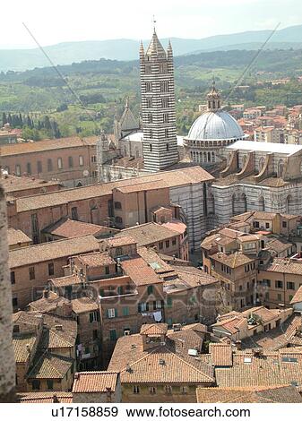 Siena, Italy, Tuscany, Toscana, Europe, Aerial view of the Duomo Campanile and the city of Siena from Torre del Mangia. View Large Photo Image Stock Photo - Siena, Italy, Tuscany, Toscana, Europe, Aerial view of the Duomo Campanile and the city of Siena from Torre del Mangia.. Fotosearch