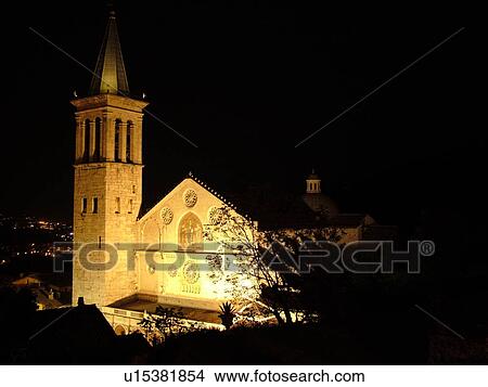 Spoleto, Italy, Umbria, Europe, The cathedral is illuminated at night in the medieval city of Spoleto. View Large Photo Image Picture - Spoleto, Italy, Umbria, Europe, The cathedral is illuminated at night in the medieval city of Spoleto.. Fotosearch