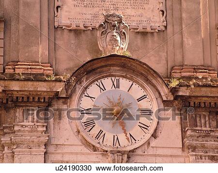 Spoleto, Umbria, Italy, Europe, Clock on the front of an old building in the Piazza del Mercato in the medieval city of Spoleto. View Large Photo Image Stock Image - Spoleto, Umbria, Italy, Europe, Clock on the front of an old building in the Piazza del Mercato in the medieval city of Spoleto.. Fotosearch