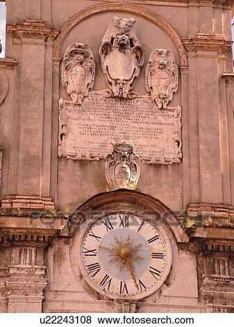 Spoleto, Umbria, Italy, Europe, Clock on the front of an old building in the Piazza del Mercato in the medieval city of Spoleto. View Large Photo Image Stock Photo - Spoleto, Umbria, Italy, Europe, Clock on the front of an old building in the Piazza del Mercato in the medieval city of Spoleto.. Fotosearch