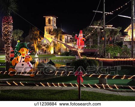 St. Augustine Beach, FL, Florida, Fiesta Falls miniature golf course decorated for the Christmas Holiday in the evening View Large Photo Image Picture - St. Augustine Beach, FL, Florida, Fiesta Falls miniature golf course decorated for the Christmas Holiday in the evening. Fotosearch