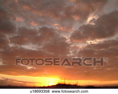 Stock Photo -  St. Augustine, FL, Florida, Anastasia Island, Anastasia State Park, Atlantic Ocean, sunrise along the coast. Fotosearch