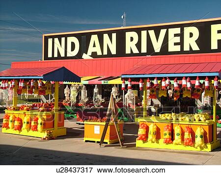 Stock Photo -  St. Augustine, FL, Florida, Interstate Exchange Fruit Stand, Indian River Fruit, Oranges and grapefruit for sale at fruit market. Fotosearch