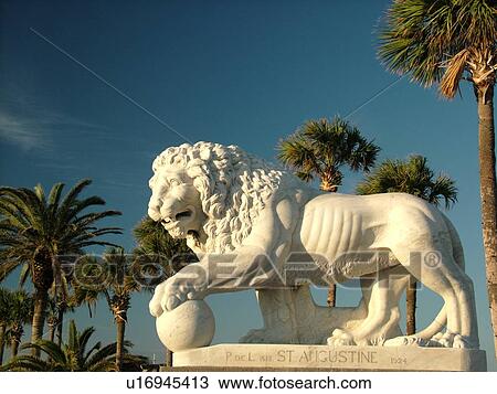 Stock Image -  St. Augustine, FL, Florida, The Old City, Lion Statue guards The Bridge of Lions. Fotosearch