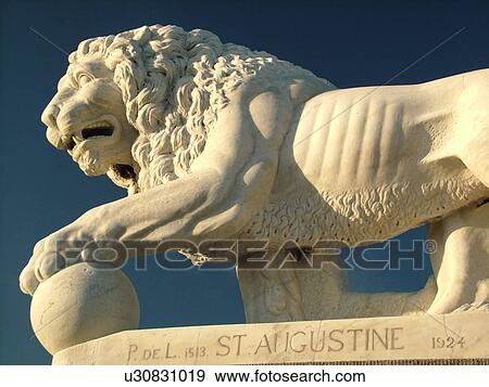 Stock Photo -  St. Augustine, FL, Florida, The Old City, Lion Statue guards The Bridge of Lions. Fotosearch