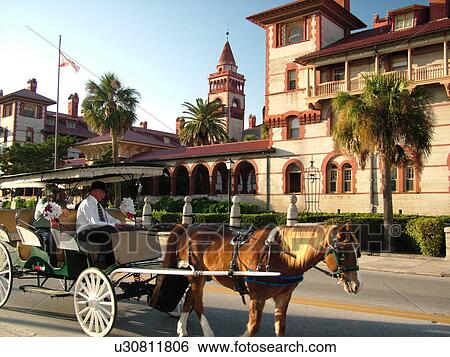 St. Augustine, FL, Florida, The Old City, Flagler College, former Hotel Ponce de Leon ca. 1888, Spanish Renaissance architecture, carriage ride View Large Photo Image Stock Photograph - St. Augustine, FL, Florida, The Old City, Flagler College, former Hotel Ponce de Leon ca. 1888, Spanish Renaissance architecture, carriage ride. Fotosearch