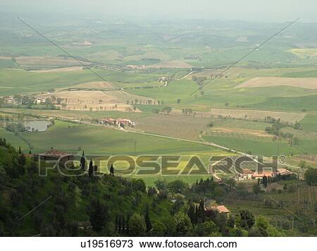 Tuscany, Italy, Montalcino, Toscana, Europe, Scenic view of the Tuscan countryside from the medieval hill town of Montalcino. View Large Photo Image Stock Image - Tuscany, Italy, Montalcino, Toscana, Europe, Scenic view of the Tuscan countryside from the medieval hill town of Montalcino.. Fotosearch