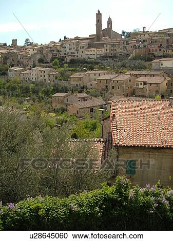 Stock Image -  Tuscany, Italy, Montalcino, Toscana, Europe, View of the medieval hilltown of Montalcino.. Fotosearch