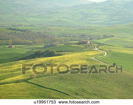 Stock Image -  Tuscany, Italy, Pienza, Toscana, Europe, Scenic view of a Tuscan home and the countryside of Tuscany in Pienza.. Fotosearch