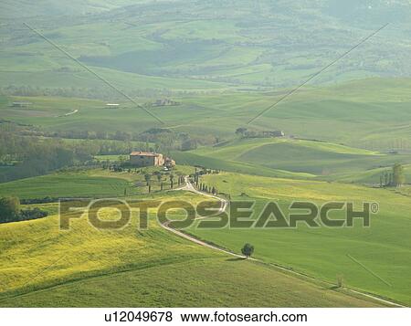 Stock Photo -  Tuscany, Italy, Pienza, Toscana, Europe, Scenic view of a Tuscan home and the countryside of Tuscany in Pienza.. Fotosearch