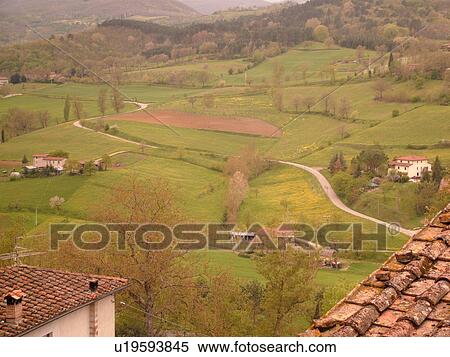 Stock Photography -  Tuscany, Italy, Poppi, Toscana, Europe, The town of Poppi and the scenic countryside of the Casentino hill region.. Fotosearch
