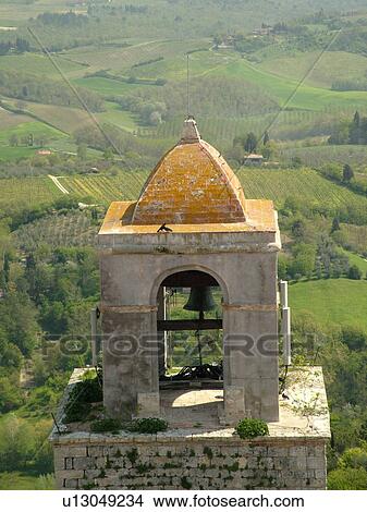 Tuscany, Italy, San Gimignano, Toscana, Europe, Bell tower and countryside from Torre Grossa in the medieval town of San Gimignano. View Large Photo Image Picture - Tuscany, Italy, San Gimignano, Toscana, Europe, Bell tower and countryside from Torre Grossa in the medieval town of San Gimignano.. Fotosearch