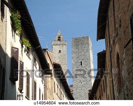 Tuscany, Italy, San Gimignano, Toscana, Europe, Buildings along Via San Gimignano in the medieval town of San Gimignano in the Chianti Region. View Large Photo Image Picture - Tuscany, Italy, San Gimignano, Toscana, Europe, Buildings along Via San Gimignano in the medieval town of San Gimignano in the Chianti Region.. Fotosearch