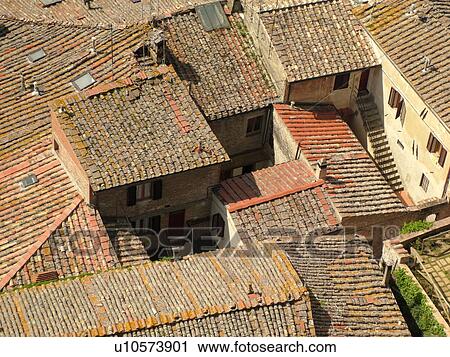 Tuscany, Italy, San Gimignano, Toscana, Europe, Aerial view of the rooftops and medieval town of San Gimignano from Torre Grossa. View Large Photo Image Stock Image - Tuscany, Italy, San Gimignano, Toscana, Europe, Aerial view of the rooftops and medieval town of San Gimignano from Torre Grossa.. Fotosearch