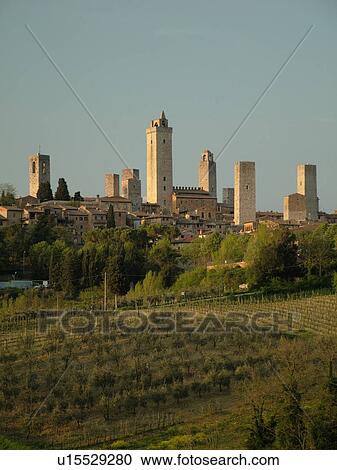 Stock Image -  Tuscany, Italy, San Gimignano, Toscana, Europe, Scenic view of the medieval town of San Gimignano in the Chianti Region.. Fotosearch