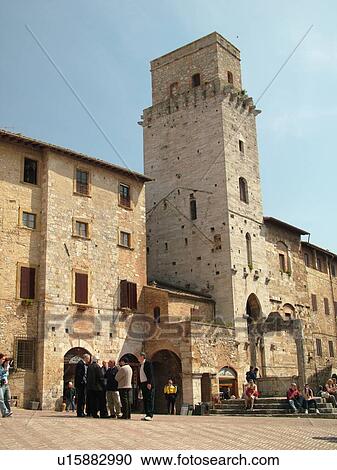 Stock Image -  Tuscany, Italy, San Gimignano, Toscana, Europe, Piazza della Cisterna in the medieval town of San Gimignano.. Fotosearch