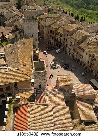 Tuscany, Italy, San Gimignano, Toscana, Europe, Aerial view of the rooftops and medieval town of San Gimignano from Torre Grossa. View Large Photo Image Stock Image - Tuscany, Italy, San Gimignano, Toscana, Europe, Aerial view of the rooftops and medieval town of San Gimignano from Torre Grossa.. Fotosearch