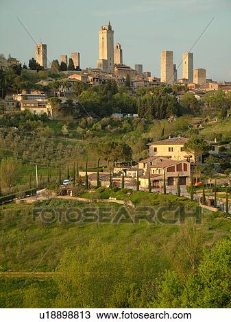 Tuscany, Italy, San Gimignano, Toscana, Europe, Scenic view of the medieval town of San Gimignano in the Chianti Region. View Large Photo Image Stock Image - Tuscany, Italy, San Gimignano, Toscana, Europe, Scenic view of the medieval town of San Gimignano in the Chianti Region.. Fotosearch